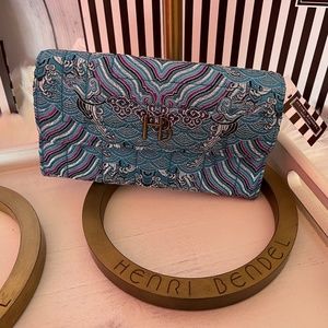 NWT - Henri Bendel large wallet multi colored pattern